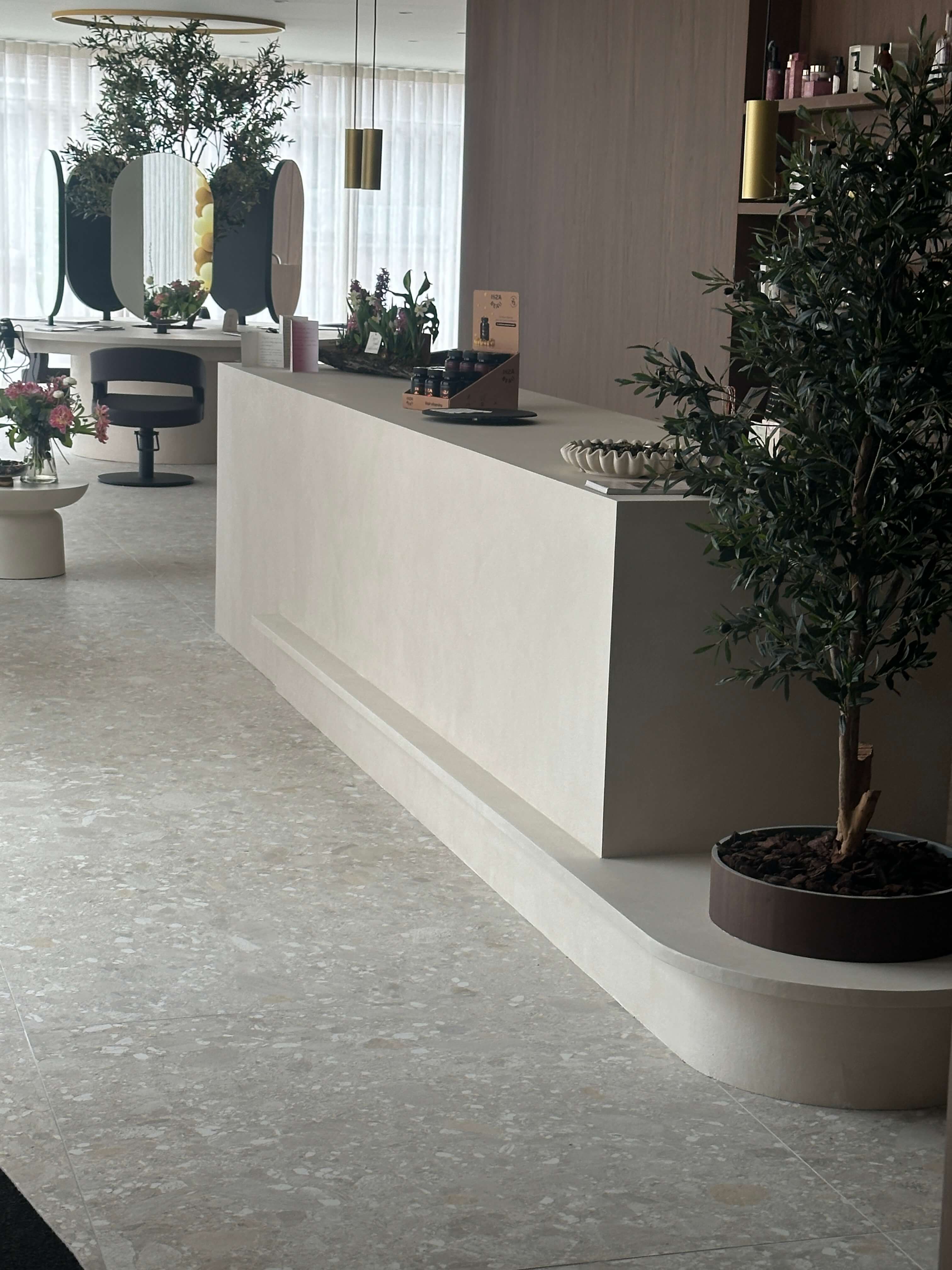 Modern hair salon with microcement finish