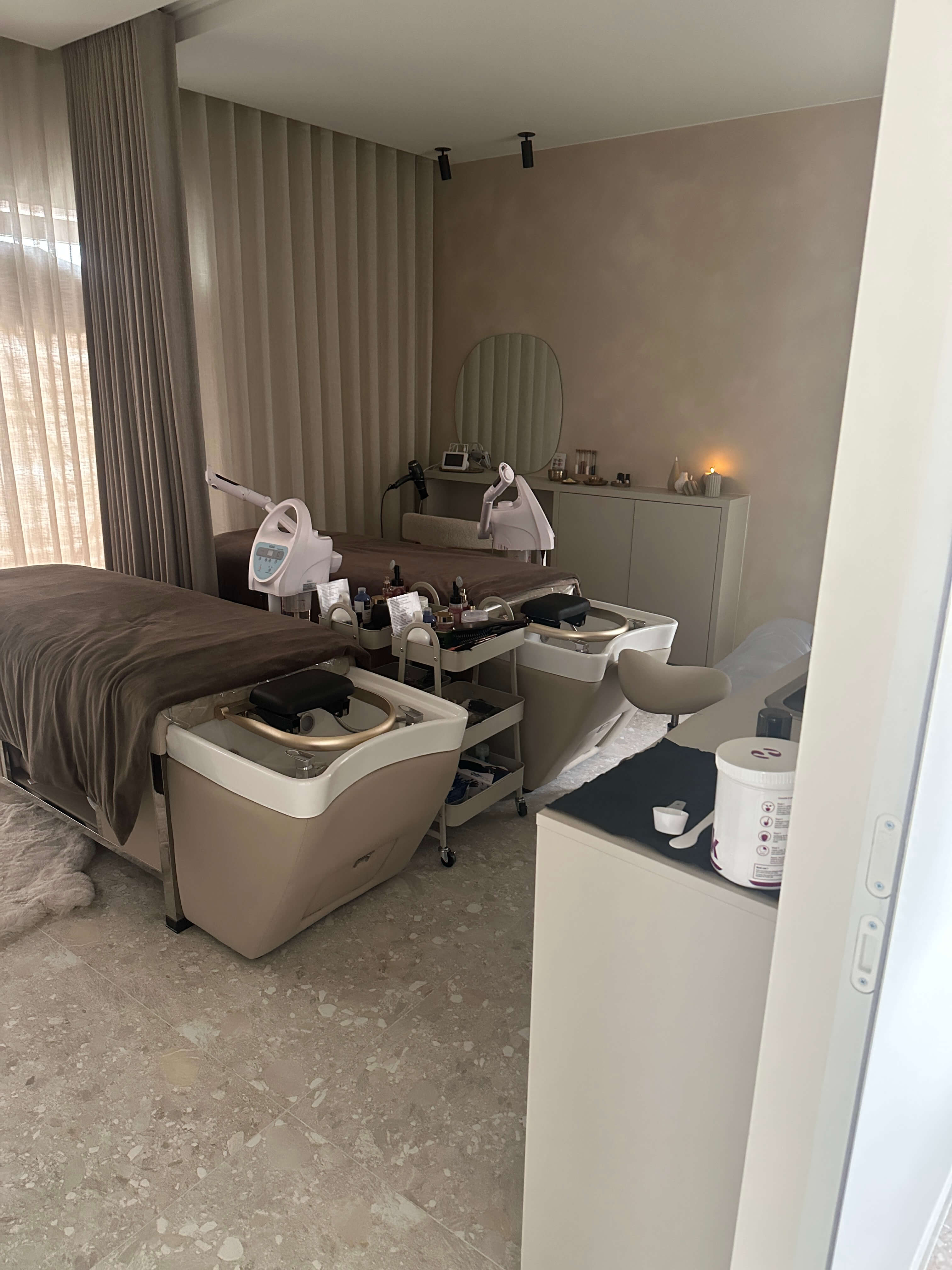 Modern massage room with microcement finish